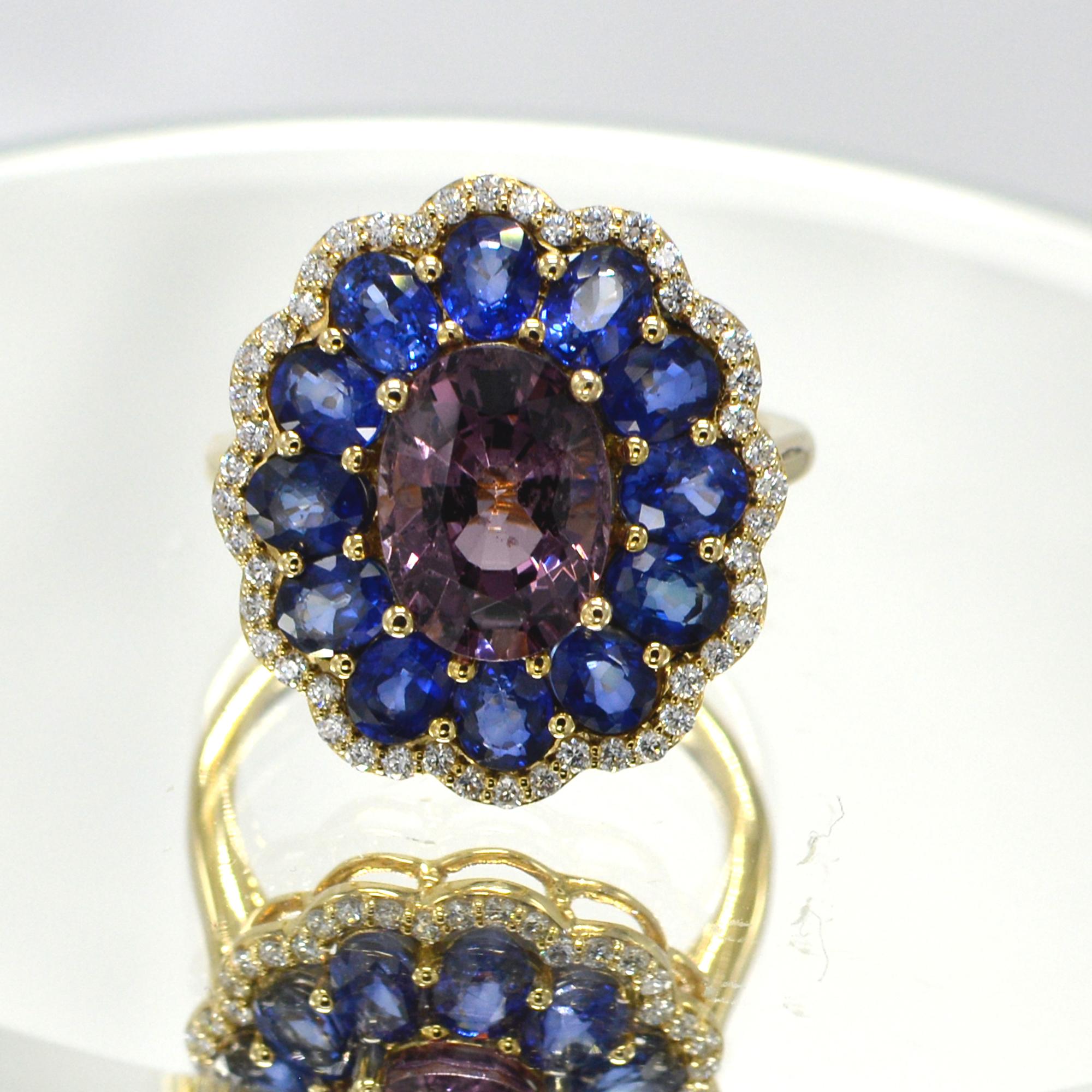 Brilliant -
Blue Sapphire &  Purple Spinel - Oval shape 3.0 carat.
14k Rose Gold  4.70 grams, 
Diamonds 0.30 carat F-G-VVS
Total Blue sapphire 3.0 carat. 
Finger size 7
all stones are natural - and none heated or treated,
overall design area size