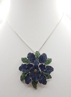 Ciondolo/spilla in zaffiro blu e tsavorite con montatura in argento