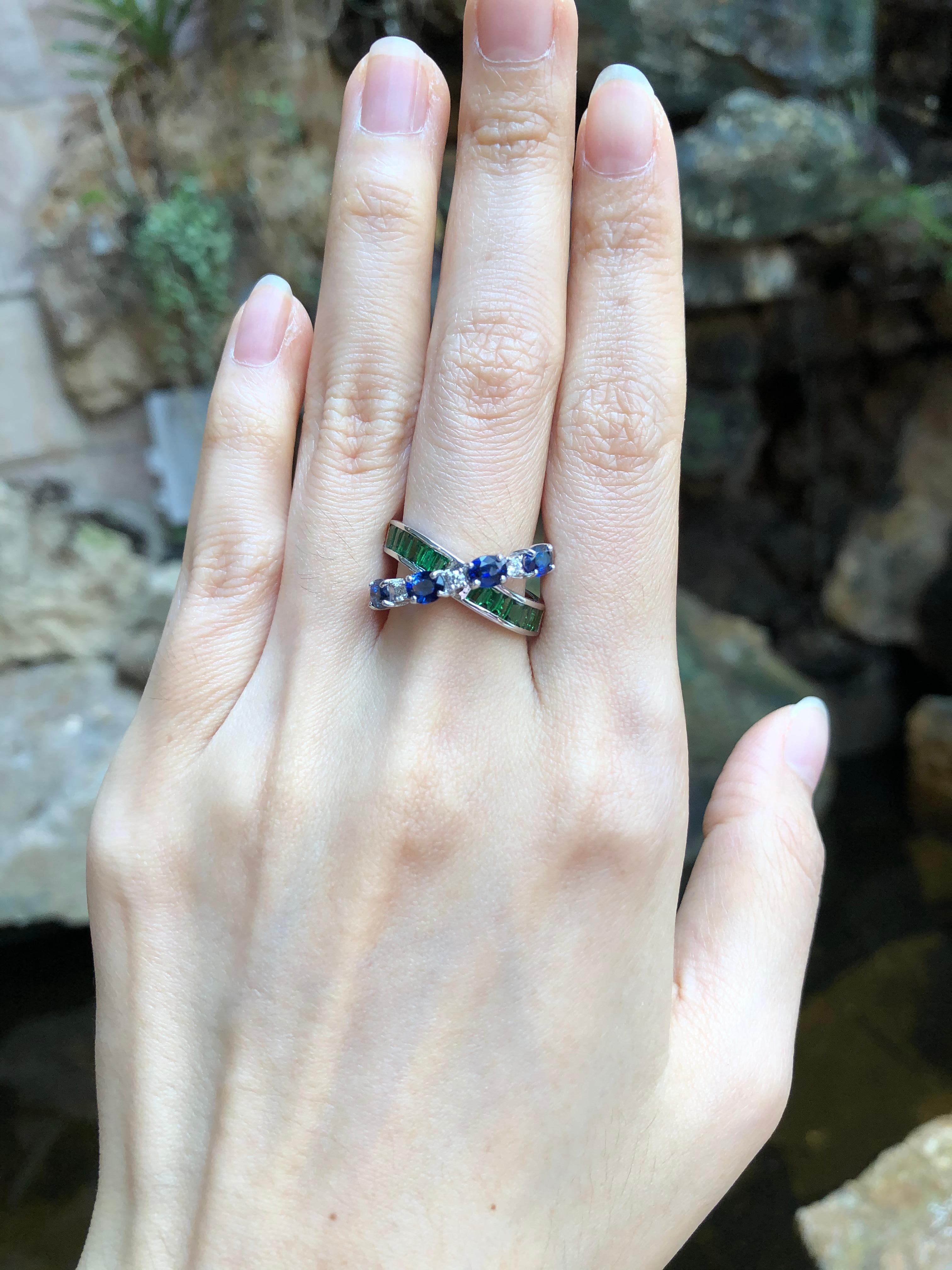 Blue Sapphire 1.43 carats  and Tsavorite 1.03 carat with Diamond 0.08 carat Ring set in 18 Karat White Gold Settings 

Width:  2.0 cm 
Length: 1.1 cm
Ring Size: 55
Total Weight: 7.63 grams

