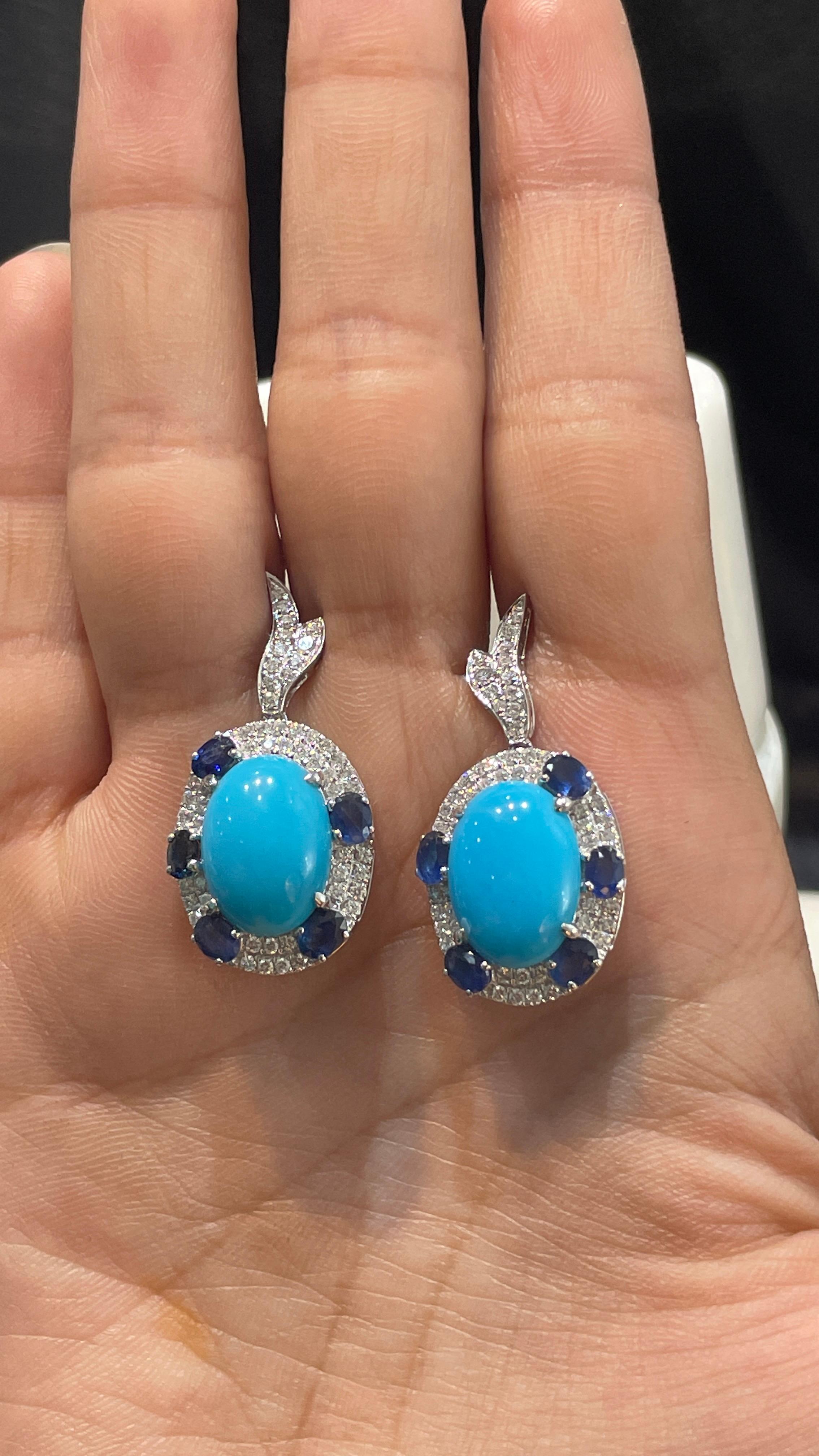 Blue Sapphire and Turquoise Drop earrings to make a statement with your look. These earrings create a sparkling, luxurious look featuring oval cut gemstone.
If you love to gravitate towards unique styles, this piece of jewelry is perfect for