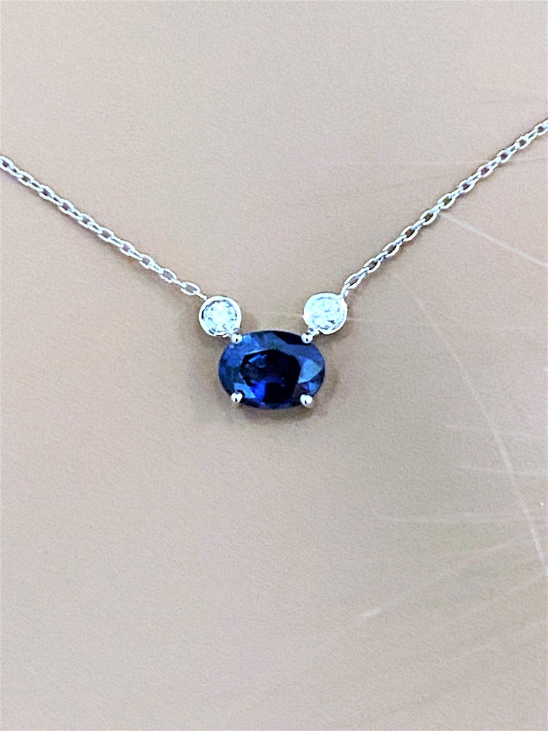 Contemporary Blue Sapphire and Two Diamonds Drop Gold Pendant Necklace For Sale