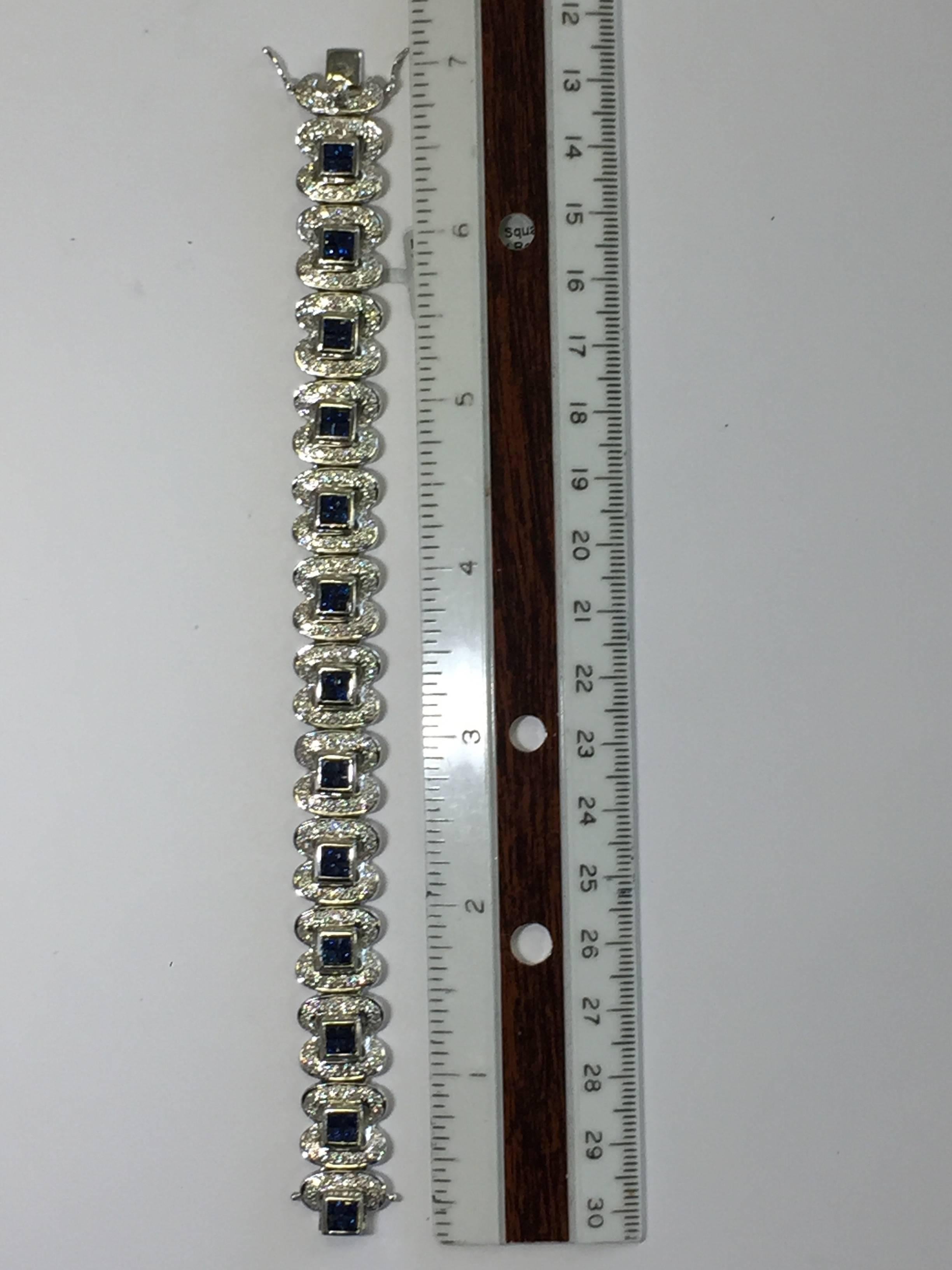 Stunning blue sapphire squares (care cuts) and white diamond 18k white gold bracelet that is 7 inches long.  
