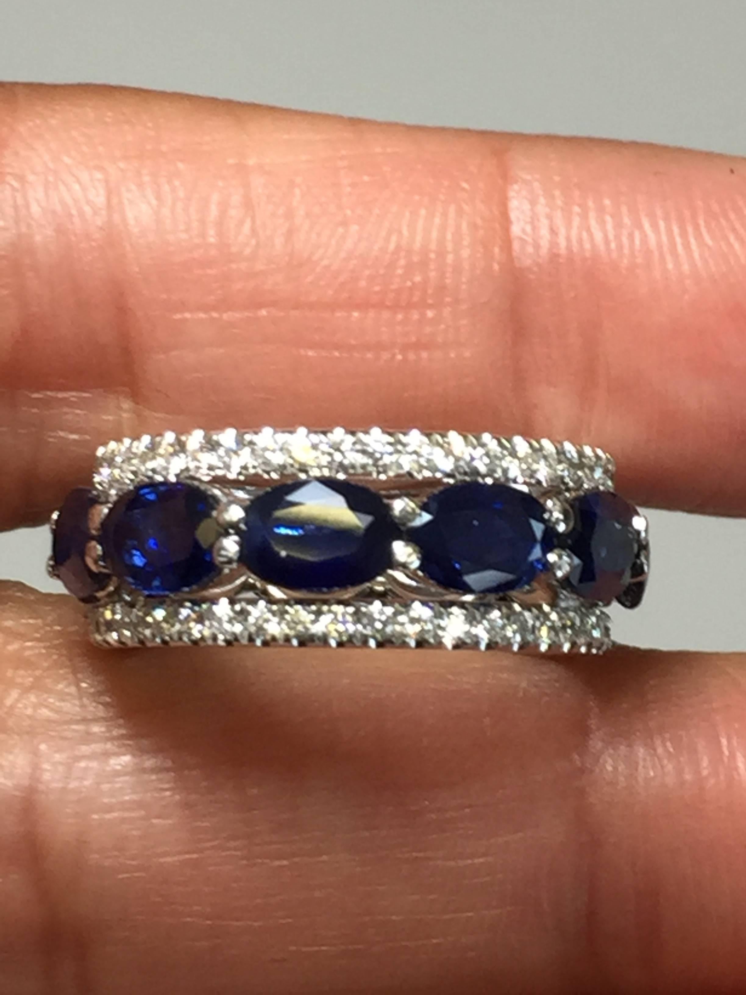Oval Cut Blue Sapphire and White Diamond Band in 18 Karat White Gold