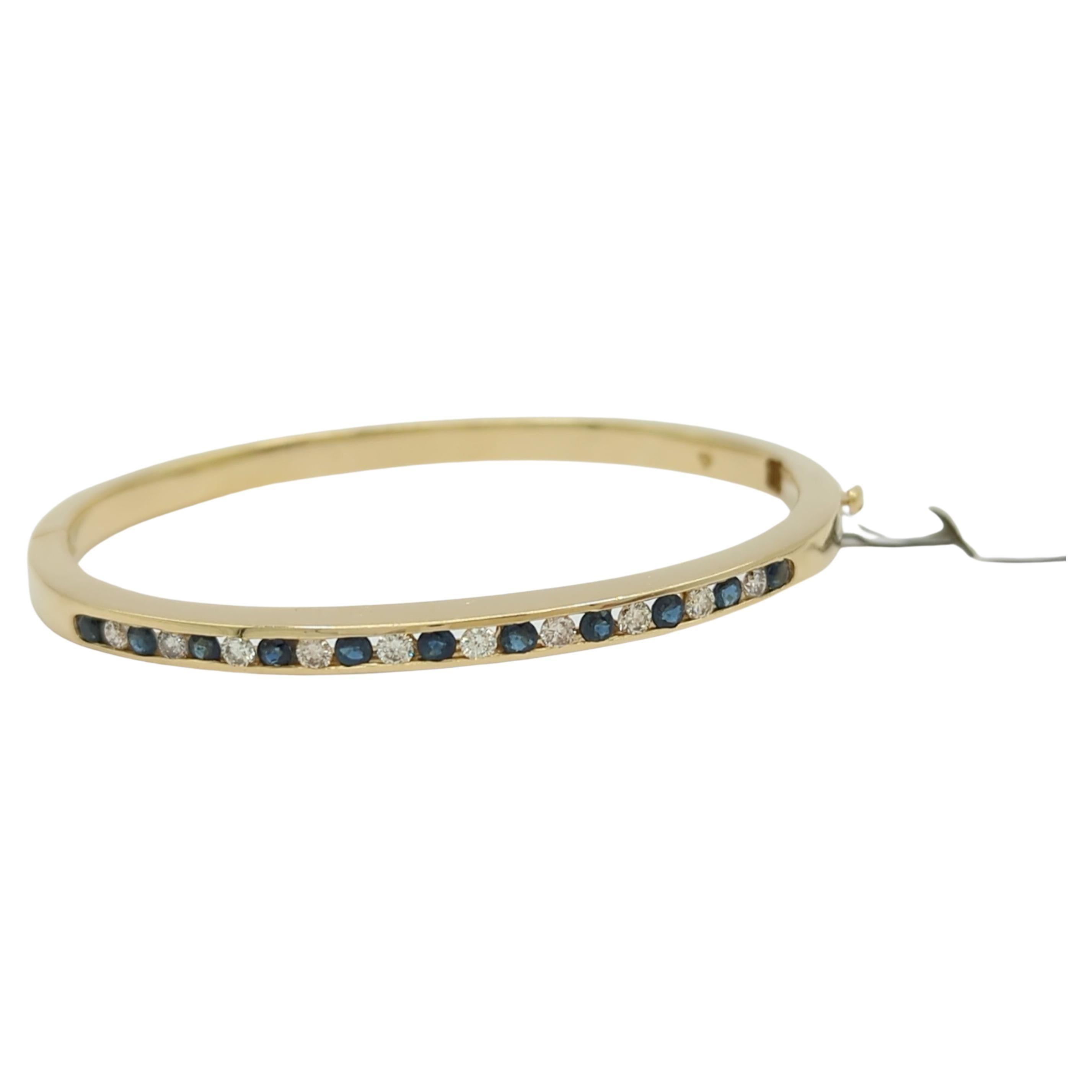 Blue Sapphire and White Diamond Bangle in 14K Yellow Gold