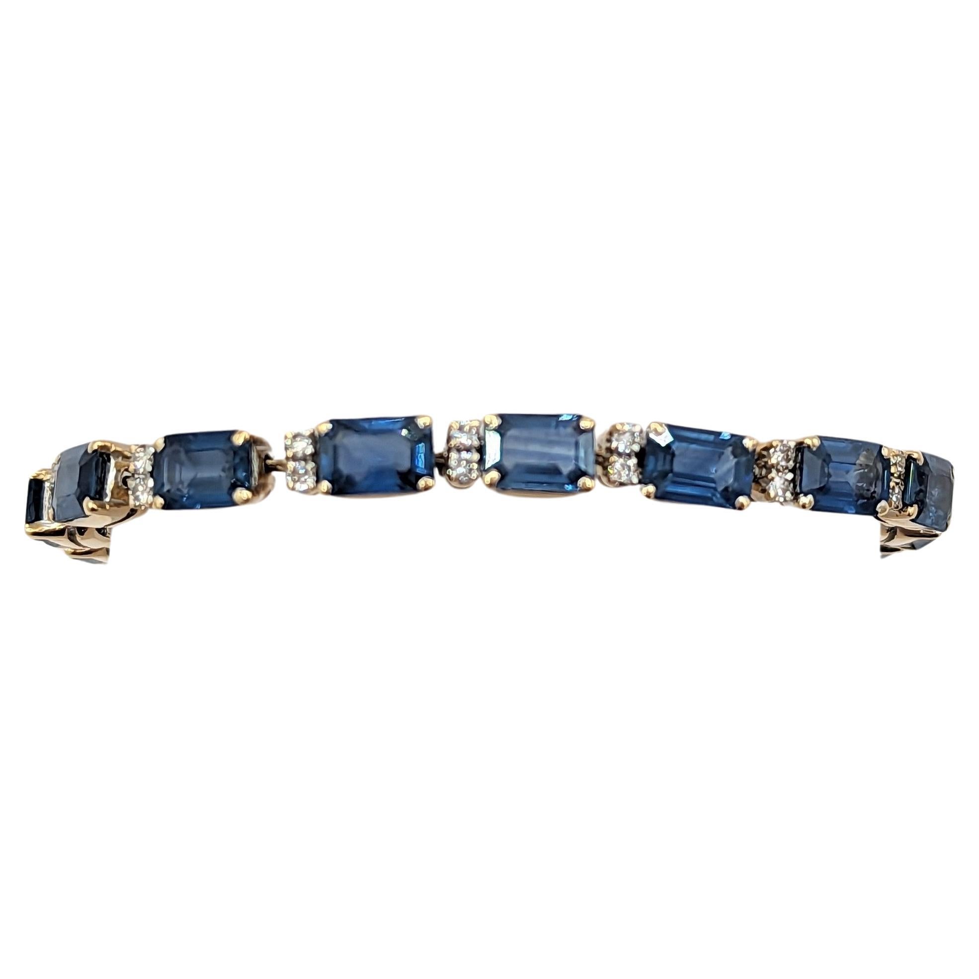 Armband aus 18 Karat Gelbgold mit blauem Saphir und weißen Diamanten im Angebot