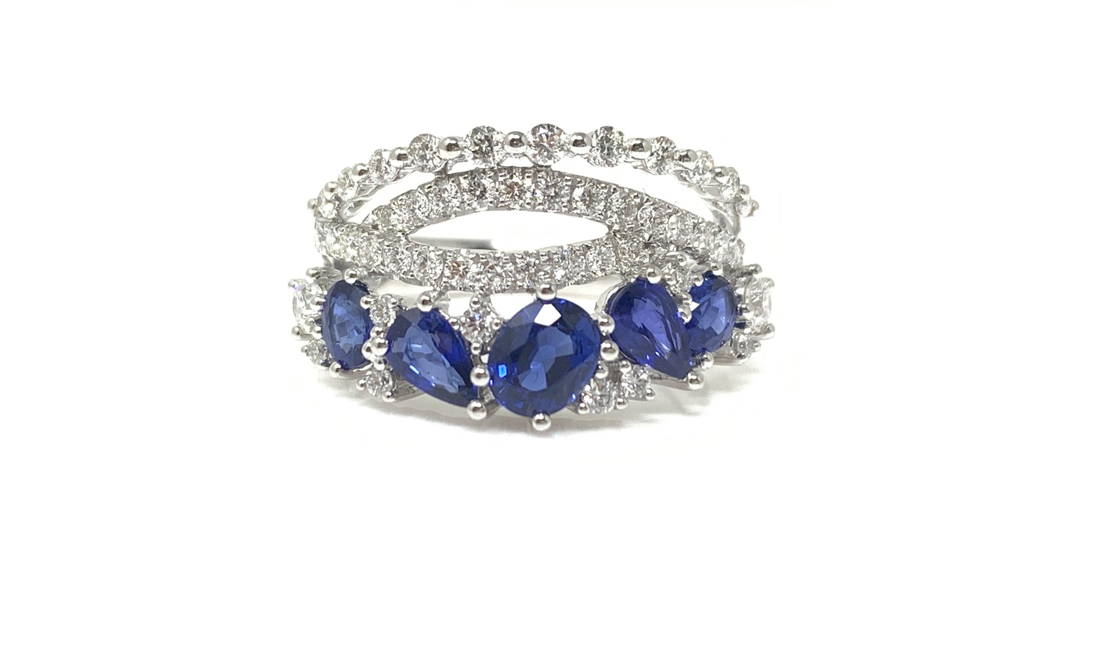 Moguldiam Inc blue sapphire and white diamond cocktail ring handmade in 18k white gold. 

Blue Sapphire weight : 1.34 carat 
Diamond weight : 0.68 carat 
Metal : 18 K white Gold 
Ring Size : 6 1/2 
