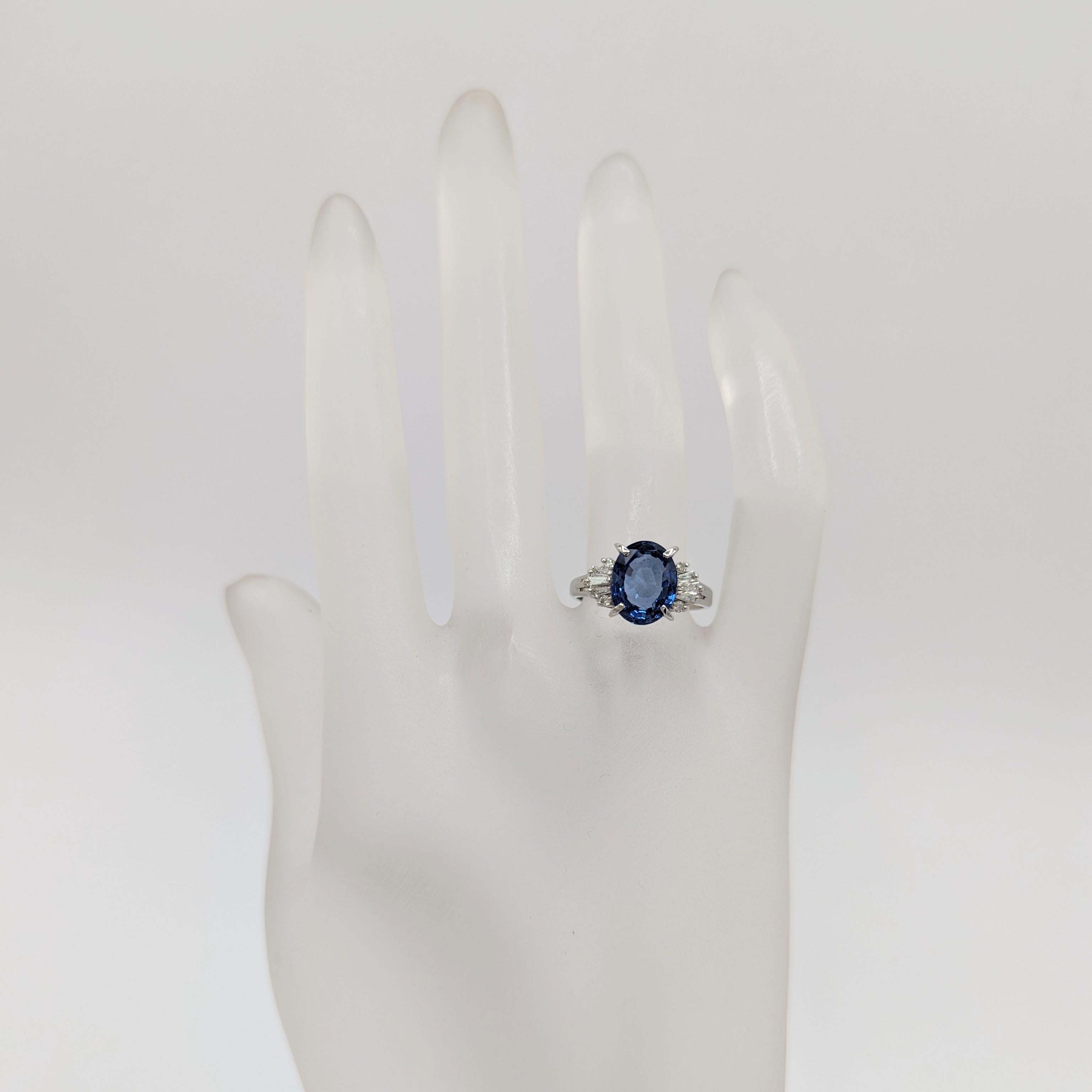 Oval Cut Blue Sapphire and White Diamond Cocktail Ring in Platinum For Sale