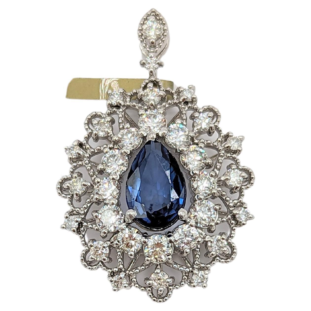 Blue Sapphire and White Diamond Pendant in Platinum For Sale