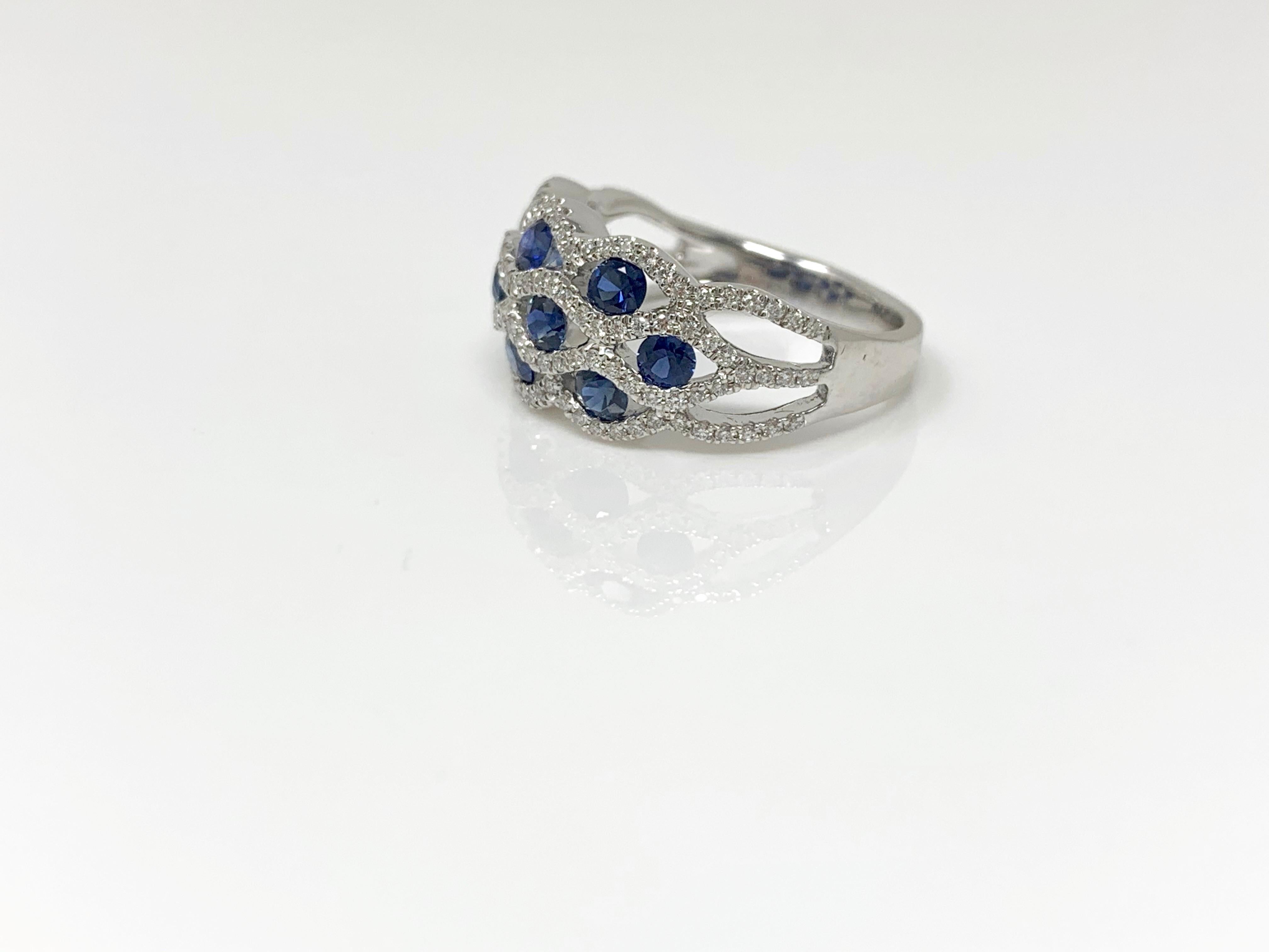 Moguldiam Inc Blue sapphire and diamond cocktail ring. 
The details are as follows : 
Blue sapphire : 1.25 carat 
Diamond weight : 0.45 carat 
Metal : 18k white gold 
ring size : 6 1/2 