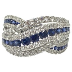 Bague en or blanc 18 carats avec saphir bleu et diamants blancs