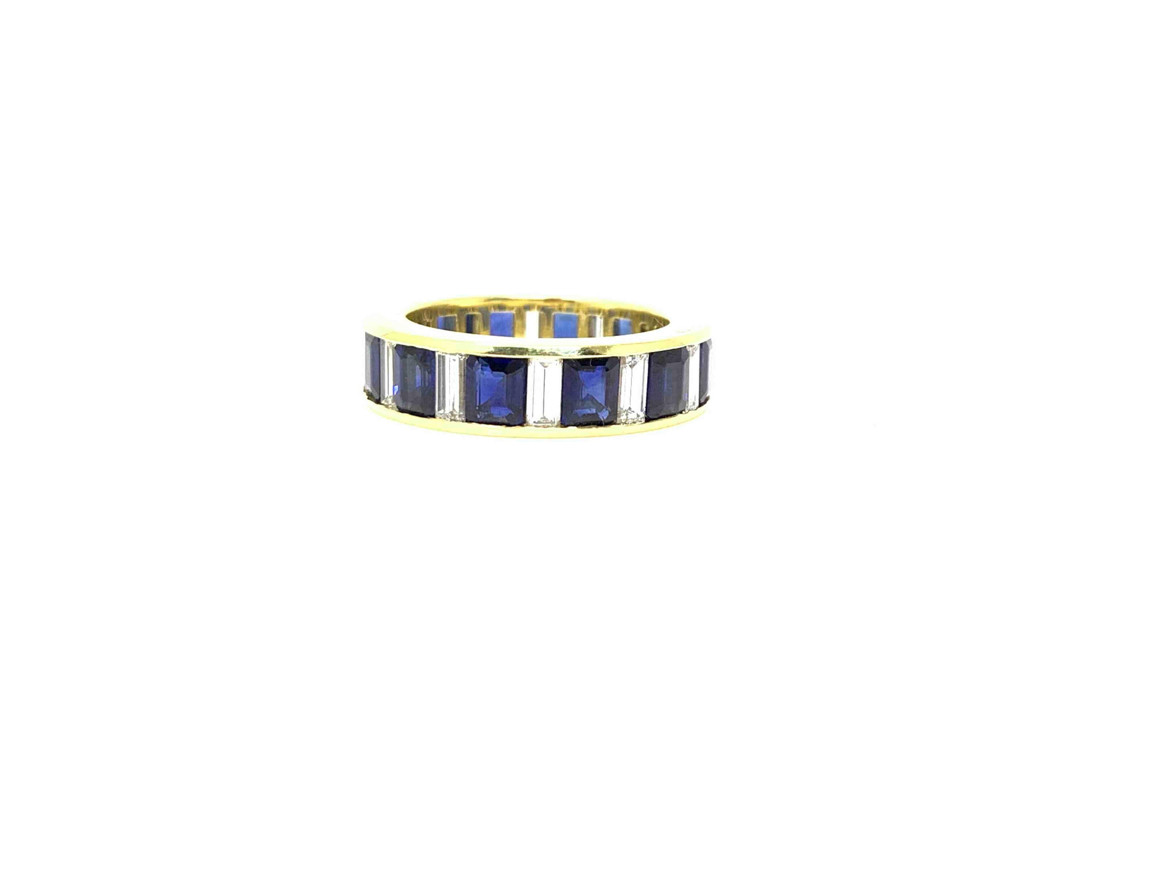 A beautiful and elegant Asscher  cut blue sapphire and white baguette diamond wedding band. 
 Blue Sapphire weight  - 4.95 carat
White Baguette diamond weight - 1.85 carat ( GH color and VS clarity)
Yellow Gold - 18k 
Ring size - 6 
Designer -