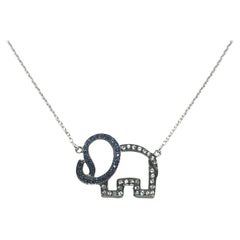 Used Blue Sapphire and White Sapphire Elephant Necklace set in Silver Settings