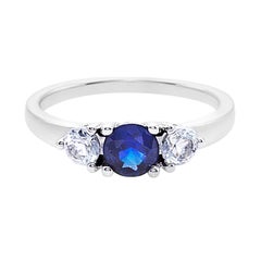 Bague de fiançailles à trois pierres en or blanc 18 carats, saphir bleu et saphir blanc