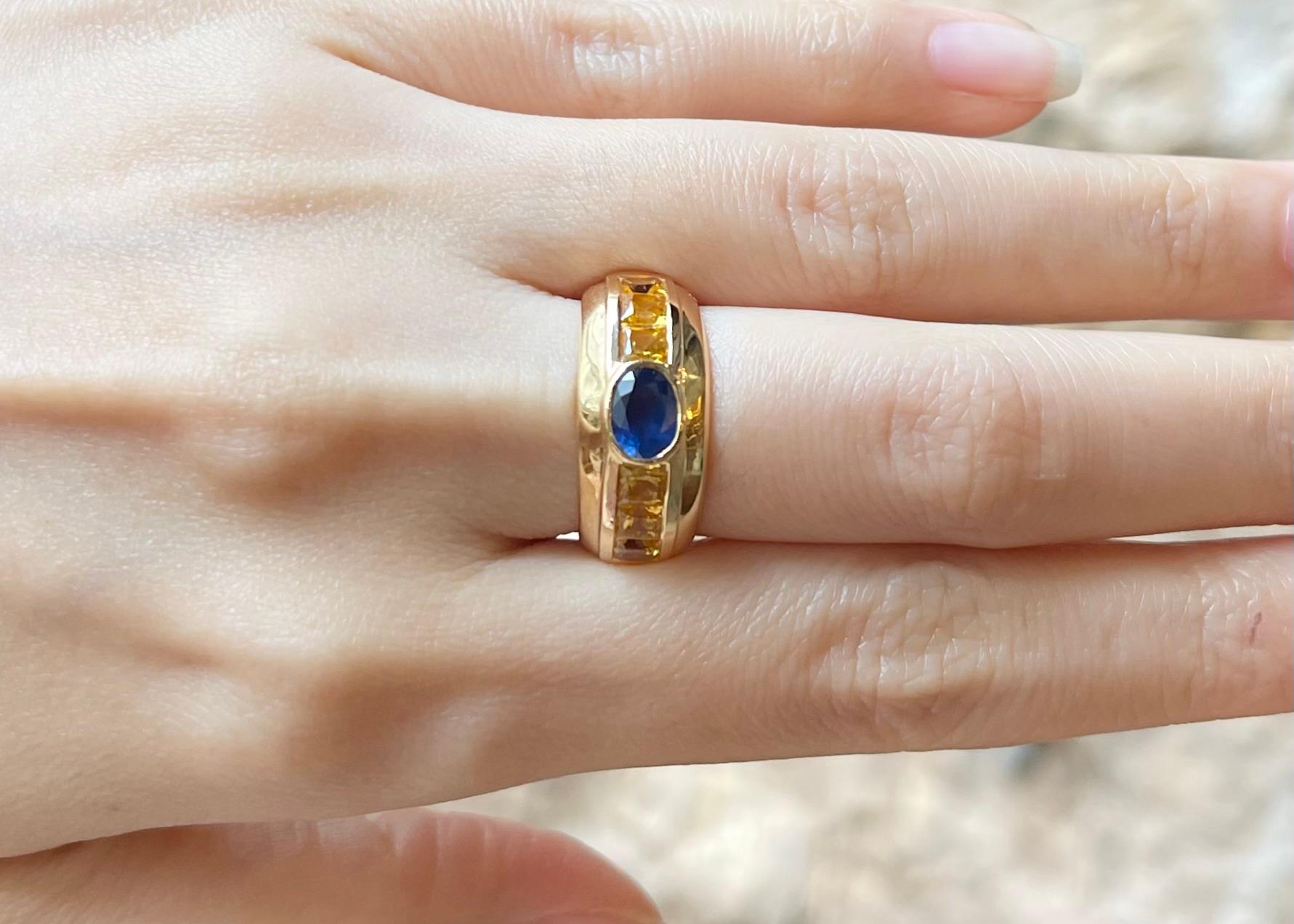 Contemporain Bague en or 18 carats sertie de saphirs bleus et saphirs jaunes en vente