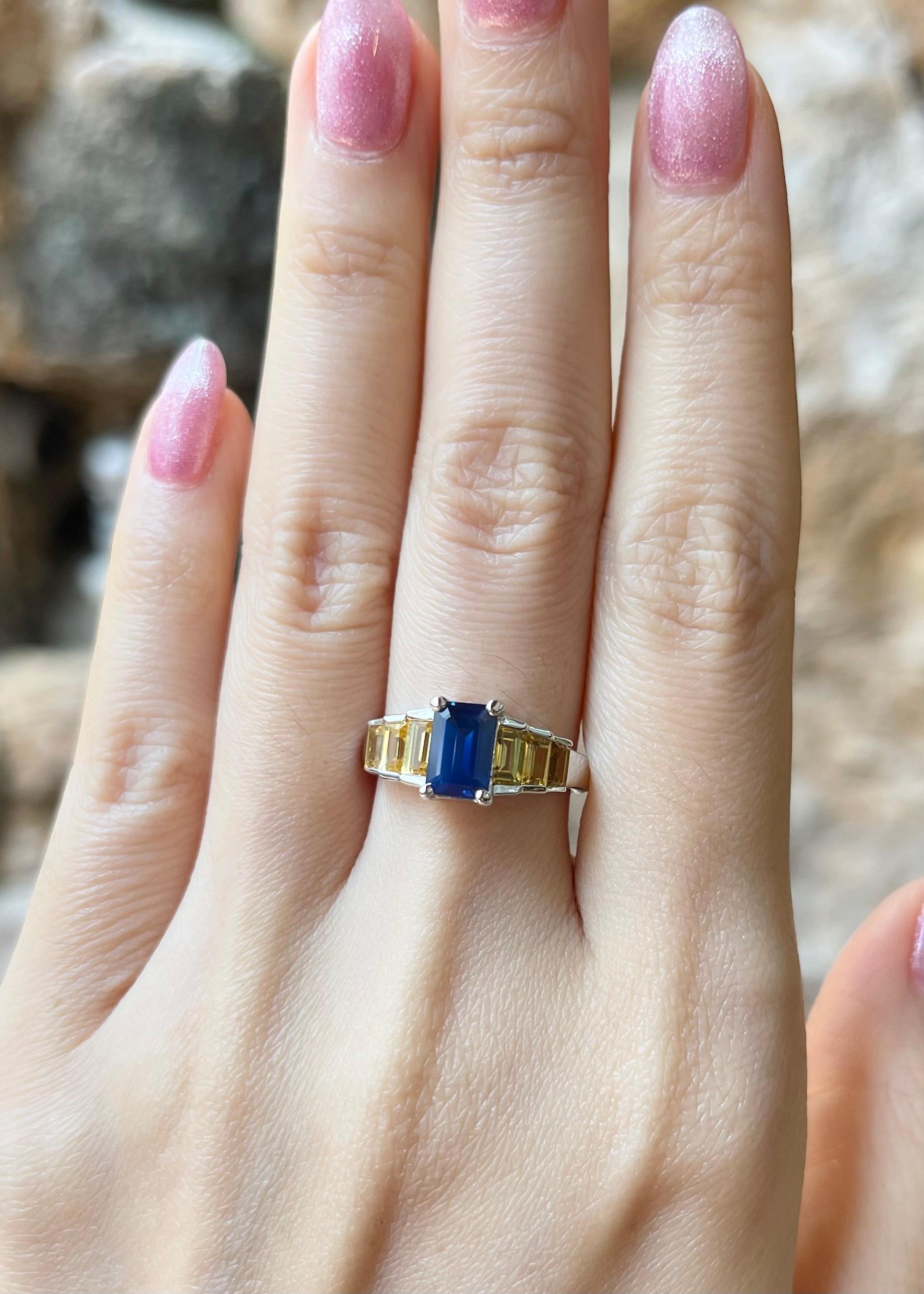 Blue Sapphire 1.35 carats and Yellow Sapphire 1.25 carats Ring set in 18K White Gold Settings

Width:  1.6 cm 
Length: 0.7 cm
Ring Size: 53
Total Weight: 5.84 grams

