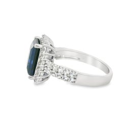 Blue Sapphire and Zircon Halo Ring in 925 Sterling Silver