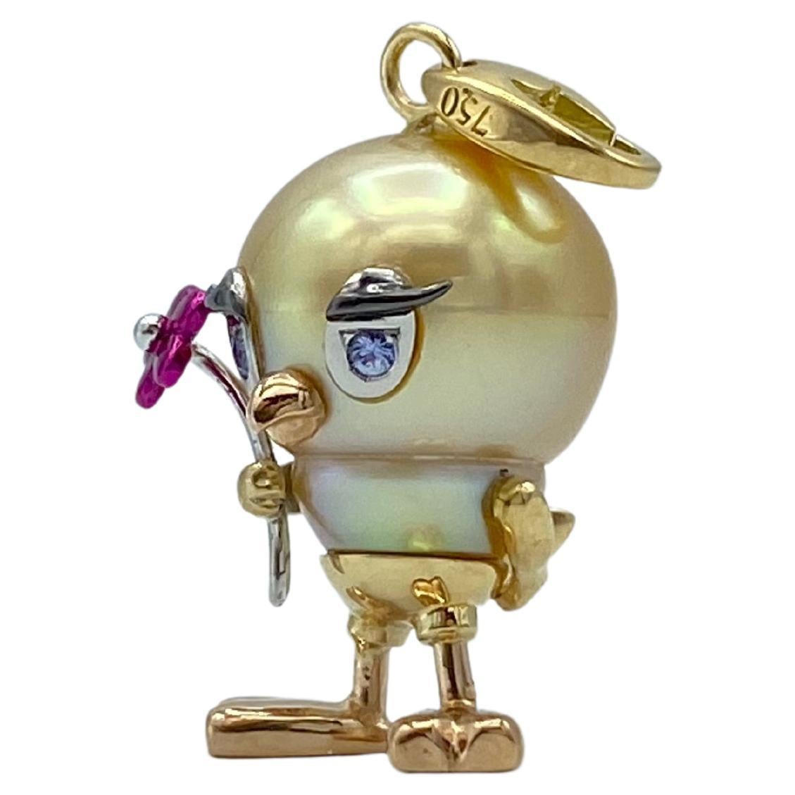 This pendant is made as if it were a caricature of a little bird, looks like Tweety.
The very beautiful Australian pearl is 16x14 mm.
The eyes set on white gold, are blue sapphires.
With his paw she holds a flower with fuchsia petals.
The legs and