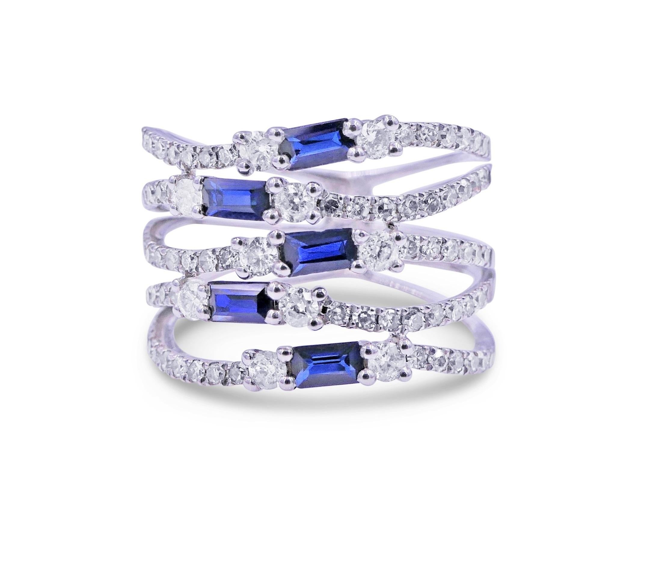 Blue Sapphire Baguette Diamond Pave 18 Karat White Gold Full Finger Band Ring
18 Karat White Gold
1.00 CT Blue Sapphires
1.00 cts Diamonds
Size 7, Resizable upon request 

Important Information:
Please note that this item will take 2-4 weeks to