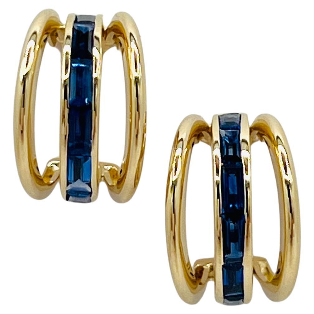 Boucles d
oreilles baguette en or jaune 14K et saphir bleu