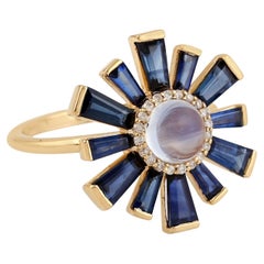 Anello Baguette con zaffiro blu e pietra di luna centrale con diamanti