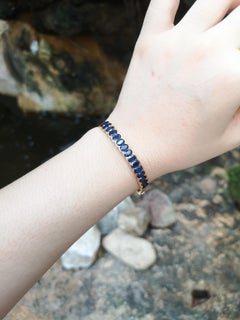 Bracciale con zaffiro blu e montatura in oro 18 carati