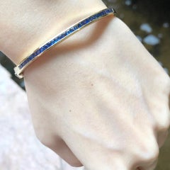 Blauer Saphir-Armreif in 18 Karat Goldfassungen