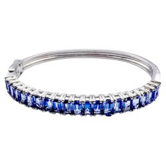 Blue Sapphire Bangle set in 18K White Gold Settings