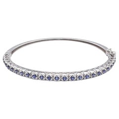 Blue Sapphire Bangle set in 18K White Gold Settings