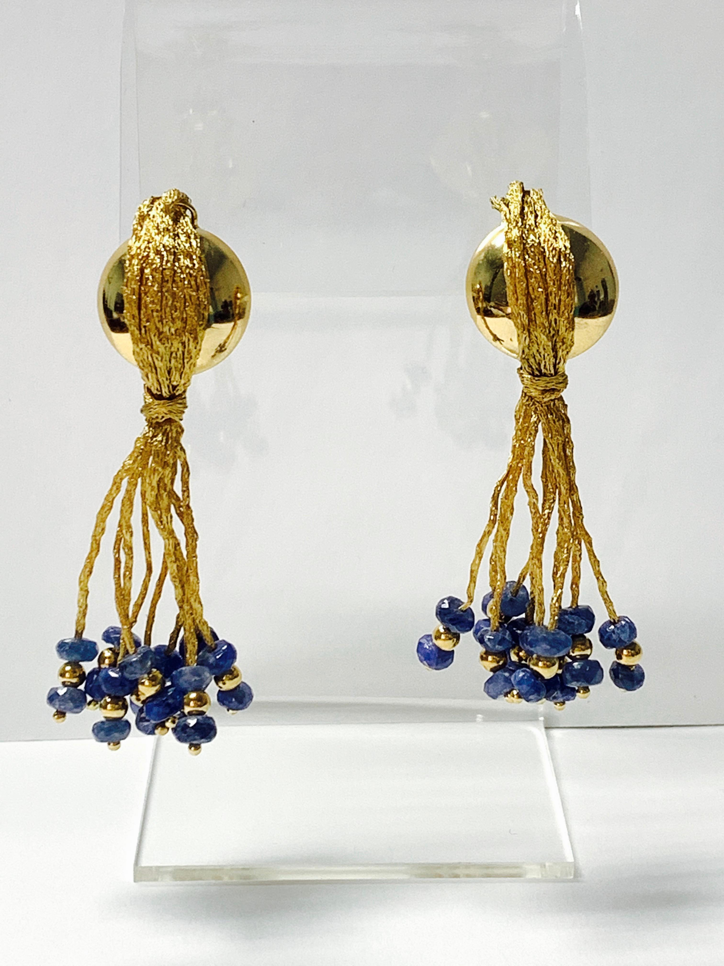 Blue sapphire bead earrings handcrafted in 18k yellow gold. 
The details are as follows : 
Blue sapphire beads weight : 5 carats approx 
Metal : Gold 
Gold weight : 15 grams 
Measurements : 2 inches 

