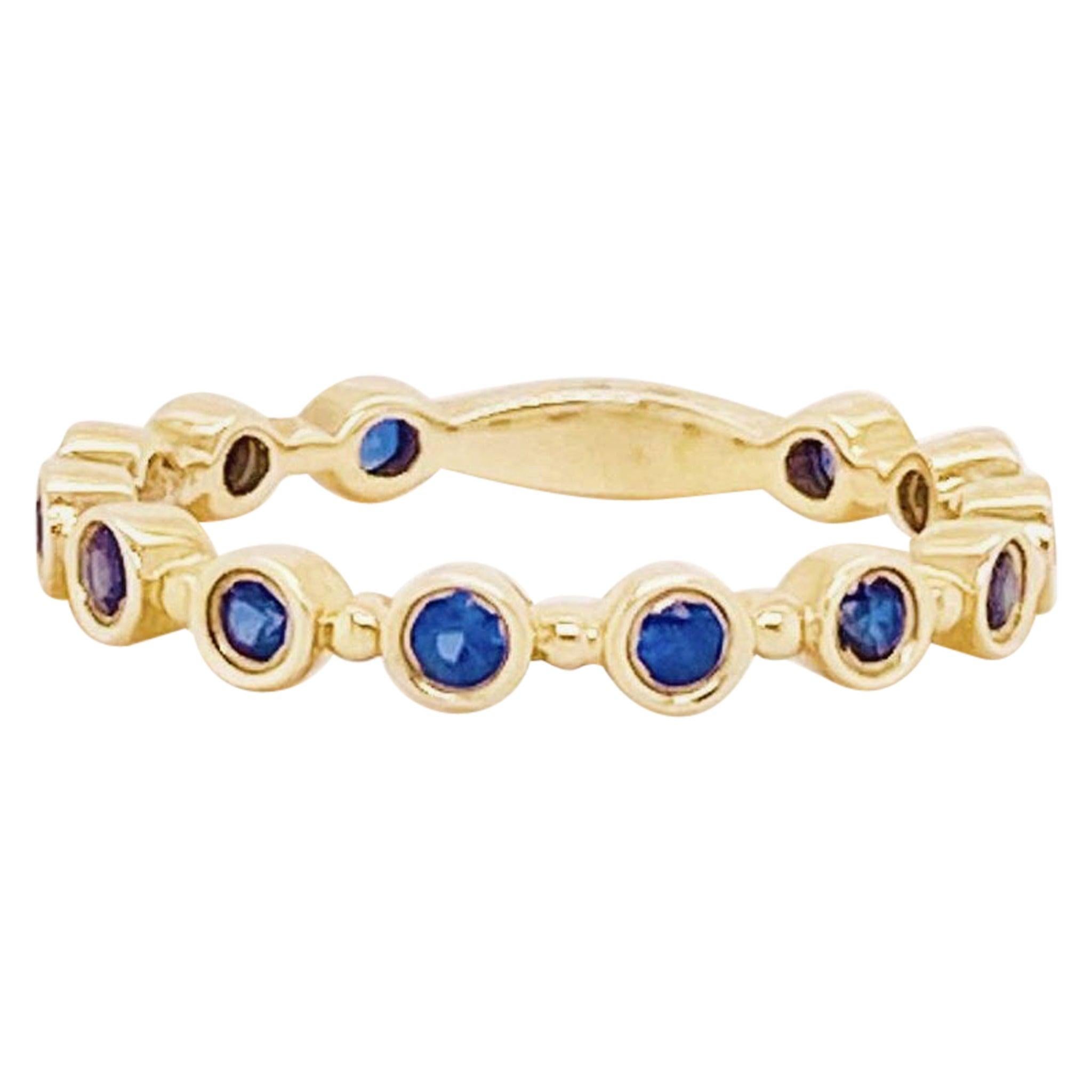 For Sale:  Blue Sapphire Bezel Band 14 Karat Gold Round Sapphire Stackable Birthstone