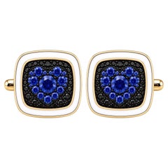Boutons de manchette en forme de cœur avec saphir bleu (pierre de naissance), émail blanc et or 14 carats, par Meghna