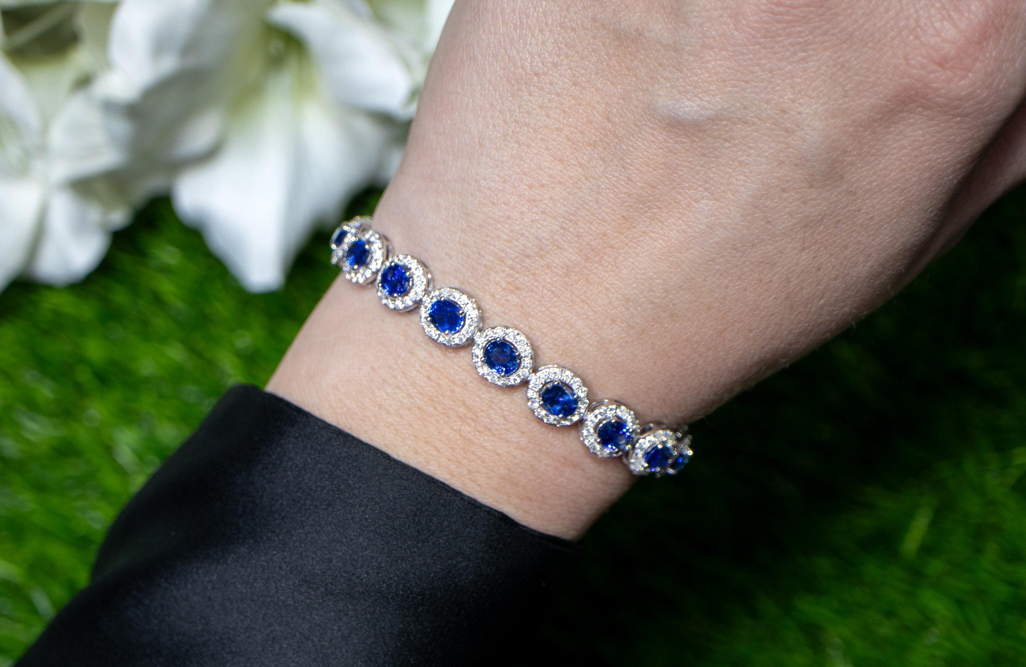 It comes with the Gemological Appraisal by GIA GG/AJP
All Gemstones are Natural
Blue Sapphires = 11.26 Carats
Diamonds = 3.44 Carats
Metal: 18K White Gold
Length: 7.25 Inches
Width: 0.33 Inches