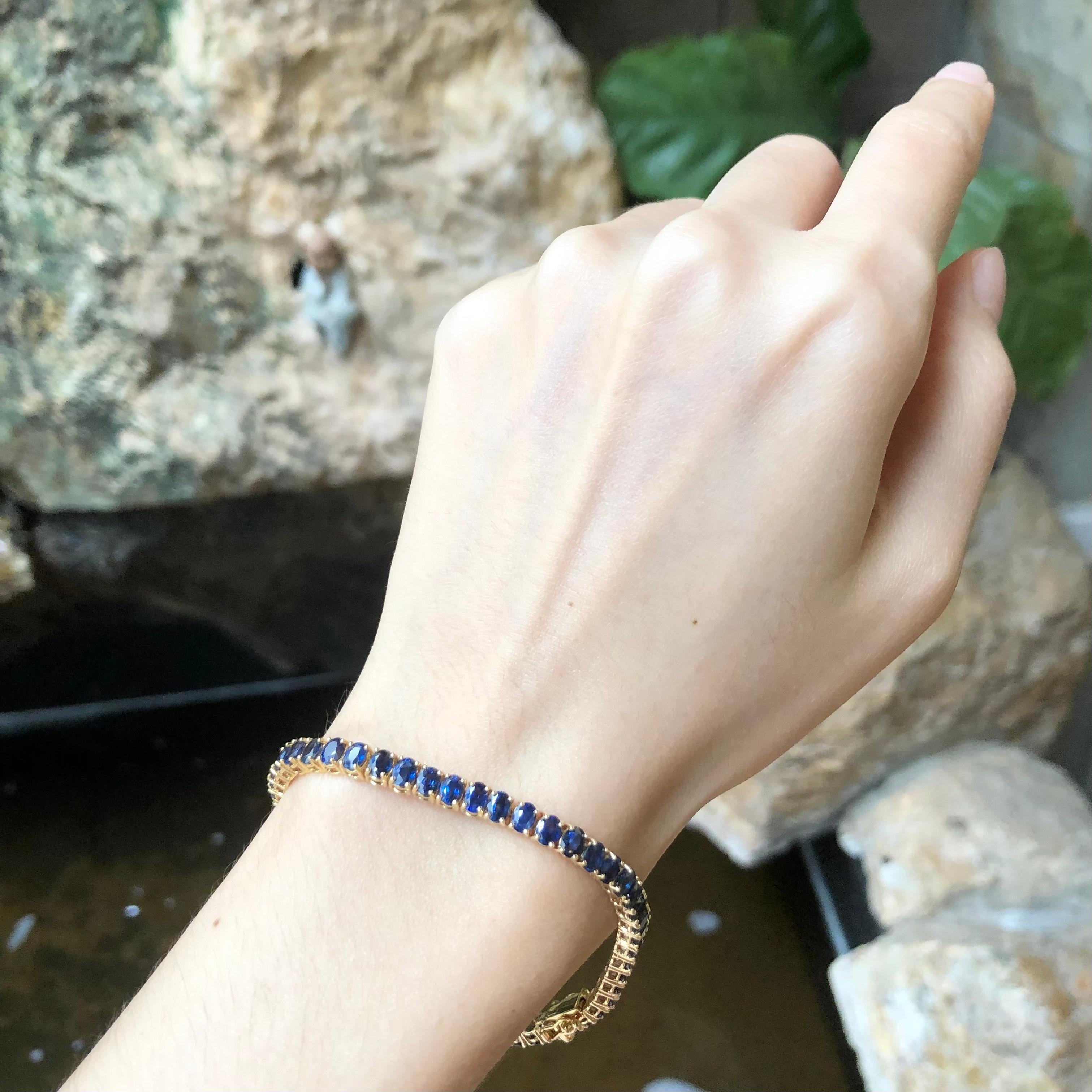Blue Sapphire 12.73 carats Bracelet set in 14 Karat Gold Settings

Width:  0.4 cm 
Length: 18.0 cm
Total Weight: 12.56 grams

