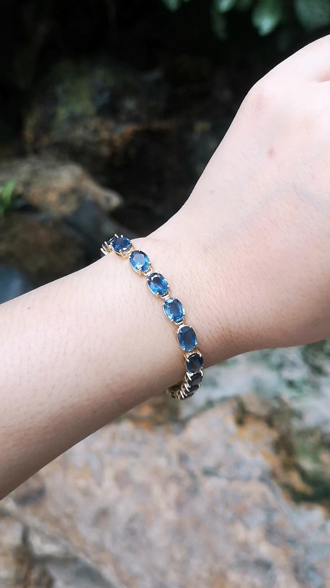 Blue Sapphire 26.53 carats Bracelet set in 18 Karat Gold Settings

Width:  0.6 cm 
Length: 18.0 cm
Total Weight: 16.64 grams

