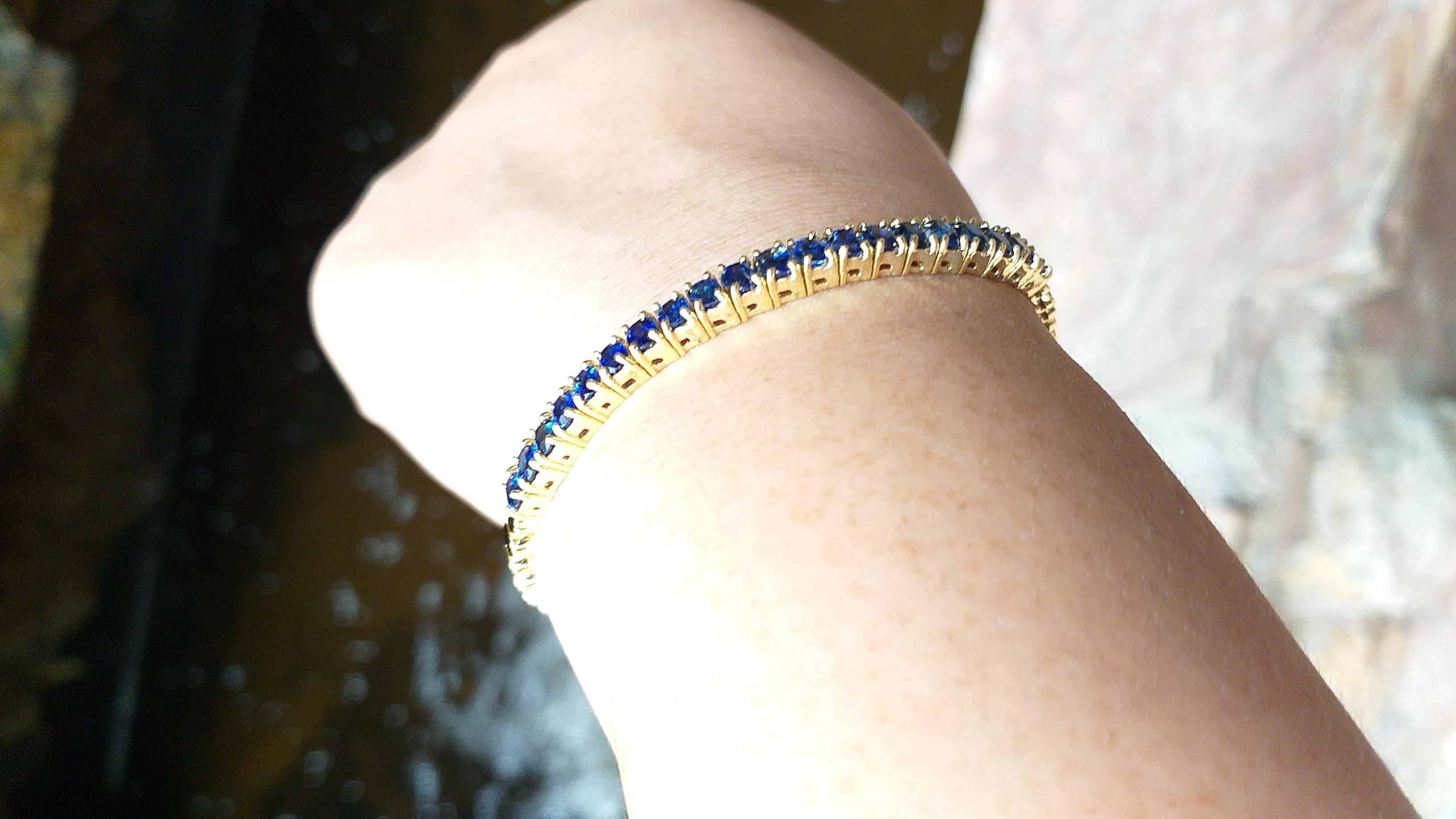 Blue Sapphire 4.70 carats Bracelet set in 18 Karat Gold Settings

Width:  0.4 cm 
Length: 18.0 cm
Total Weight: 16.88 grams

