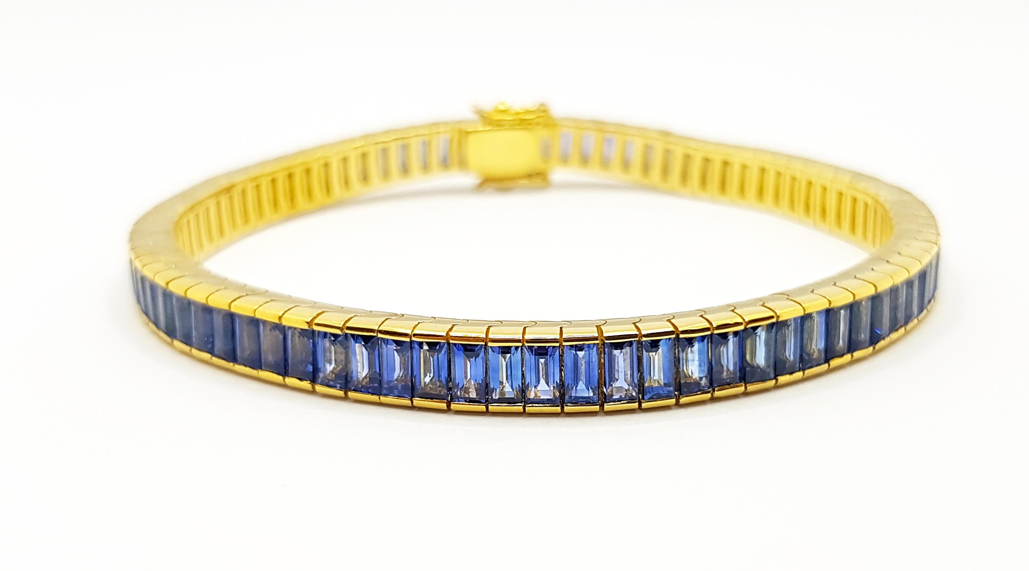 Emerald Cut Blue Sapphire Bracelet Set in 18 Karat Gold Settings For Sale