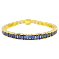 Blauer blauer Saphir-Armband in 18 Karat Goldfassung