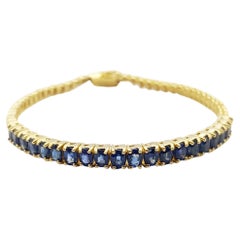 Saphir bleu  Bracelet serti dans des montures en or 18 carats