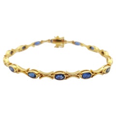 Bracciale di zaffiri blu con montatura in oro 18 carati