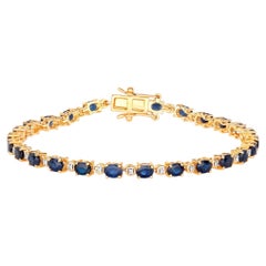 Bracciale con zaffiro blu e diamanti 5,54 carati in oro giallo 14 carati