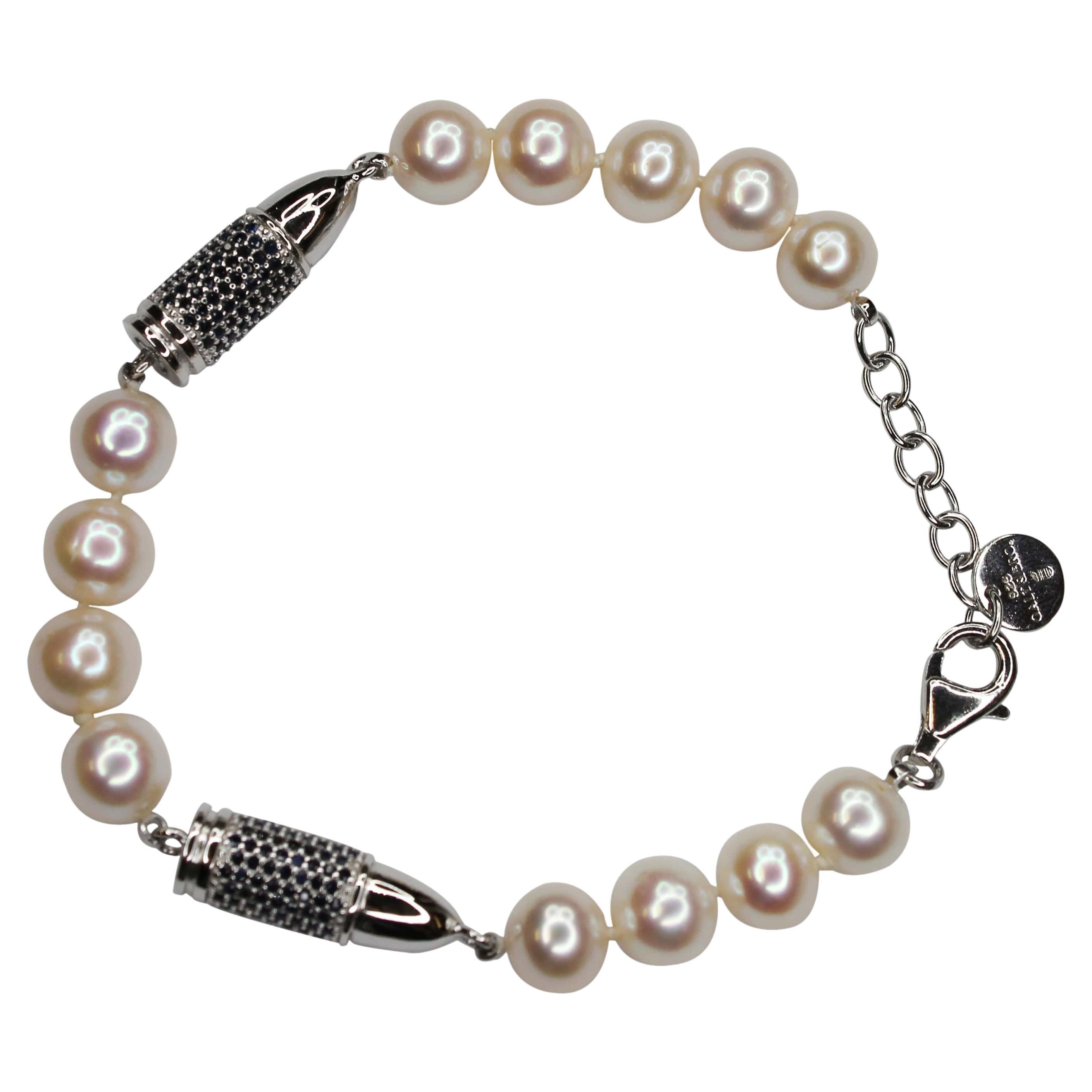 Bracelet en argent sterling avec saphirs bleus sertis en pavé et perles blanches en forme de balle
