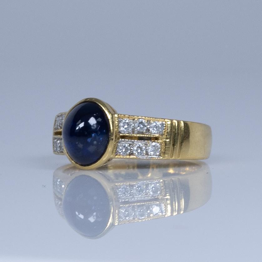 Women's Blue Sapphire Cabochon Bezel Set in Diamond Split Shank 90% Yellow Gold Ring