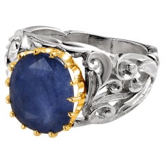 Anillo de cóctel con cabujón de zafiro azul grabado a mano