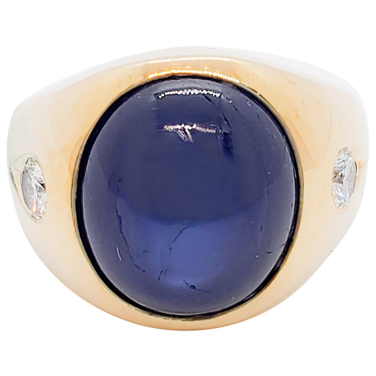 Blue Sapphire Cabochon Oval and White Diamond Ring in 14 Karat Yellow Gold