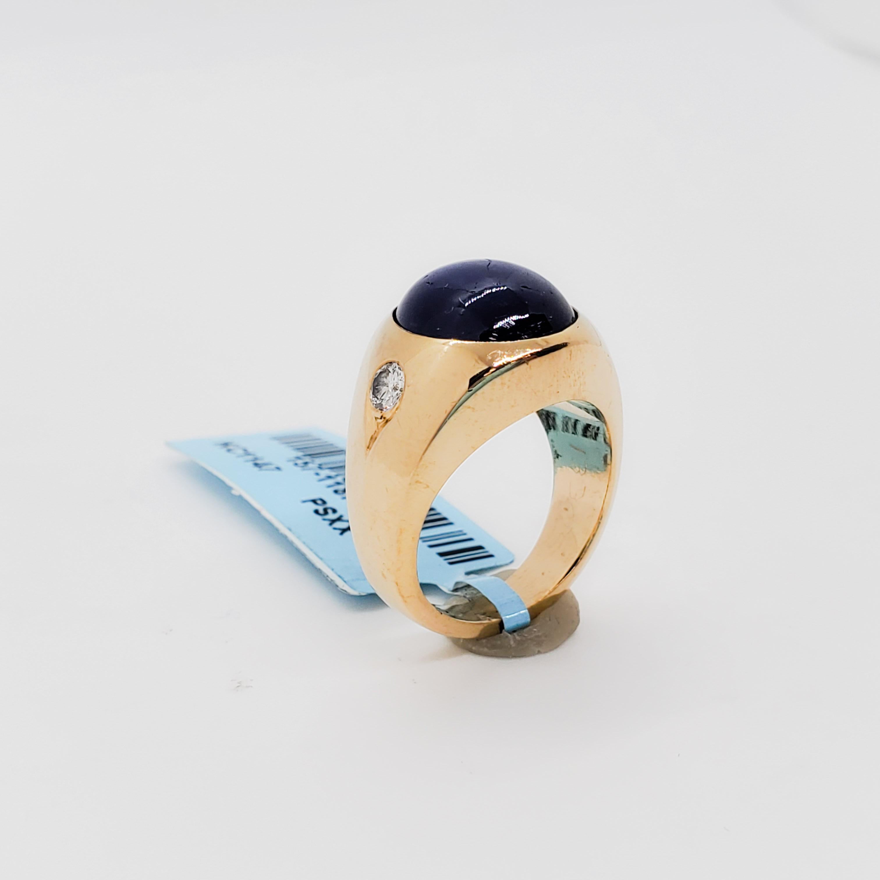Blue Sapphire Cabochon Oval and White Diamond Ring in 14 Karat Yellow Gold 1
