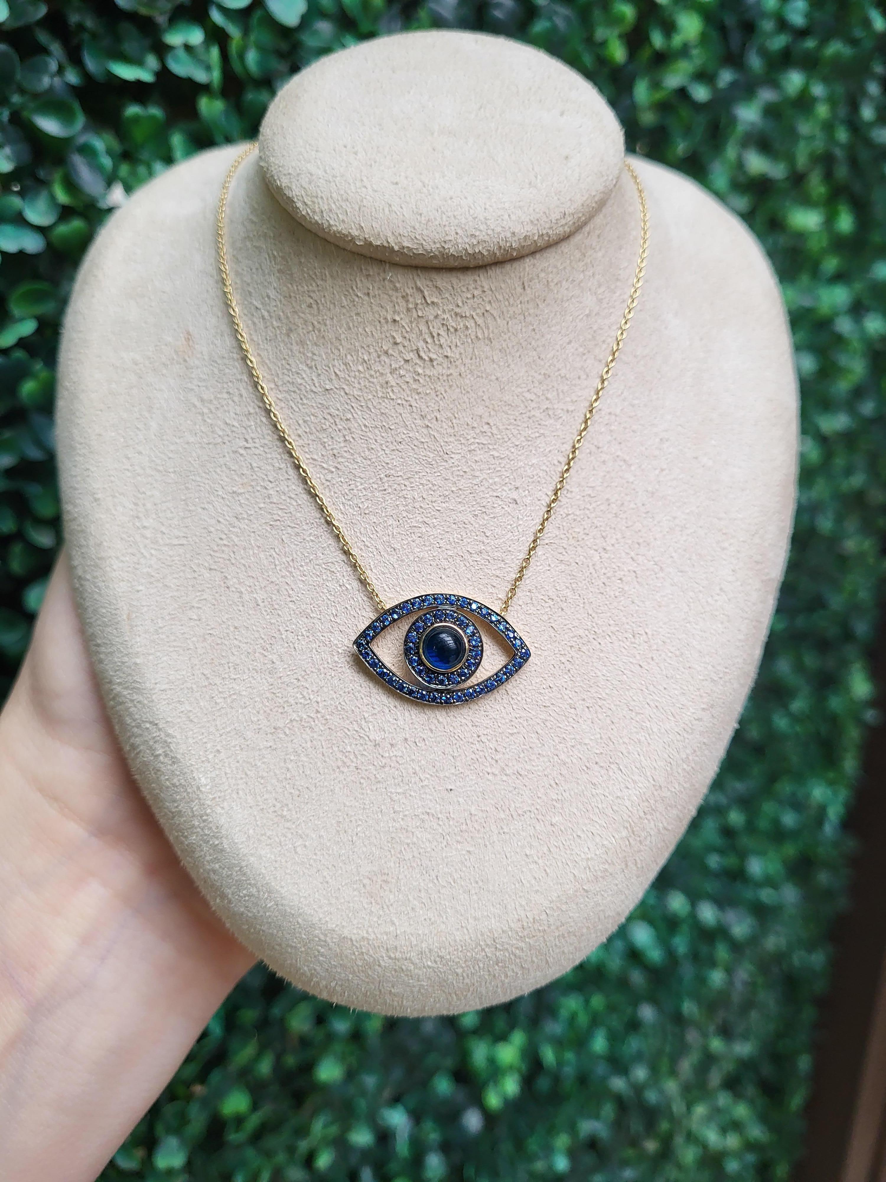 Round Cut Blue Sapphire Cabochon & Round Sapphire 14k Yellow Gold Evil Eye Pendant For Sale