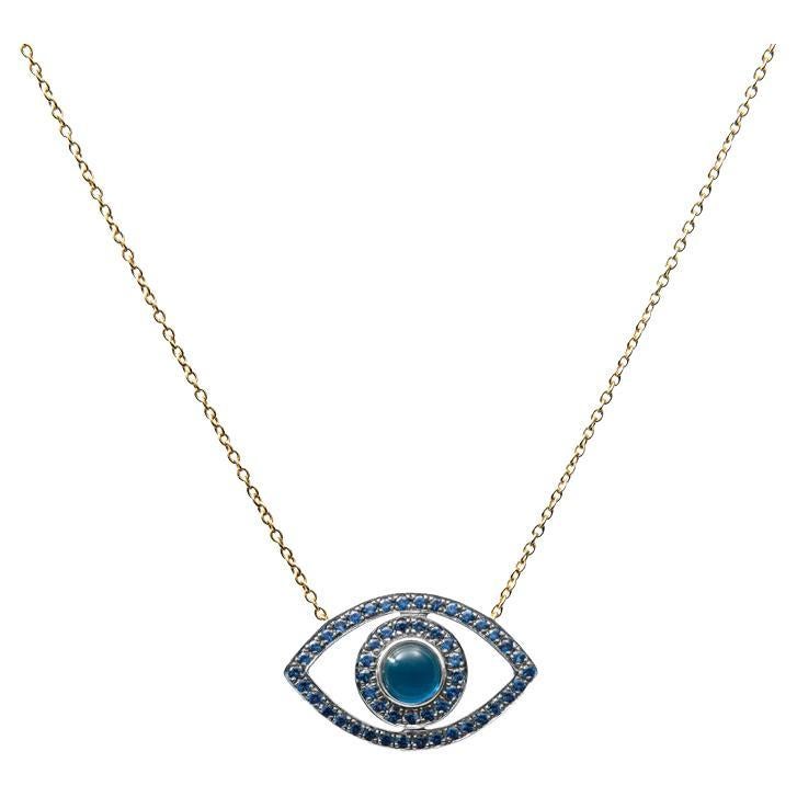 Blue Sapphire Cabochon & Round Sapphire 14k Yellow Gold Evil Eye Pendant For Sale