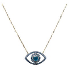 Blue Sapphire Cabochon & Round Sapphire 14k Yellow Gold Evil Eye Pendant