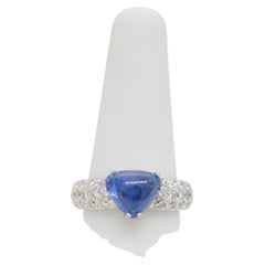 Blue Sapphire Cabochon Trillion and White Diamond Cocktail Ring in Platinum