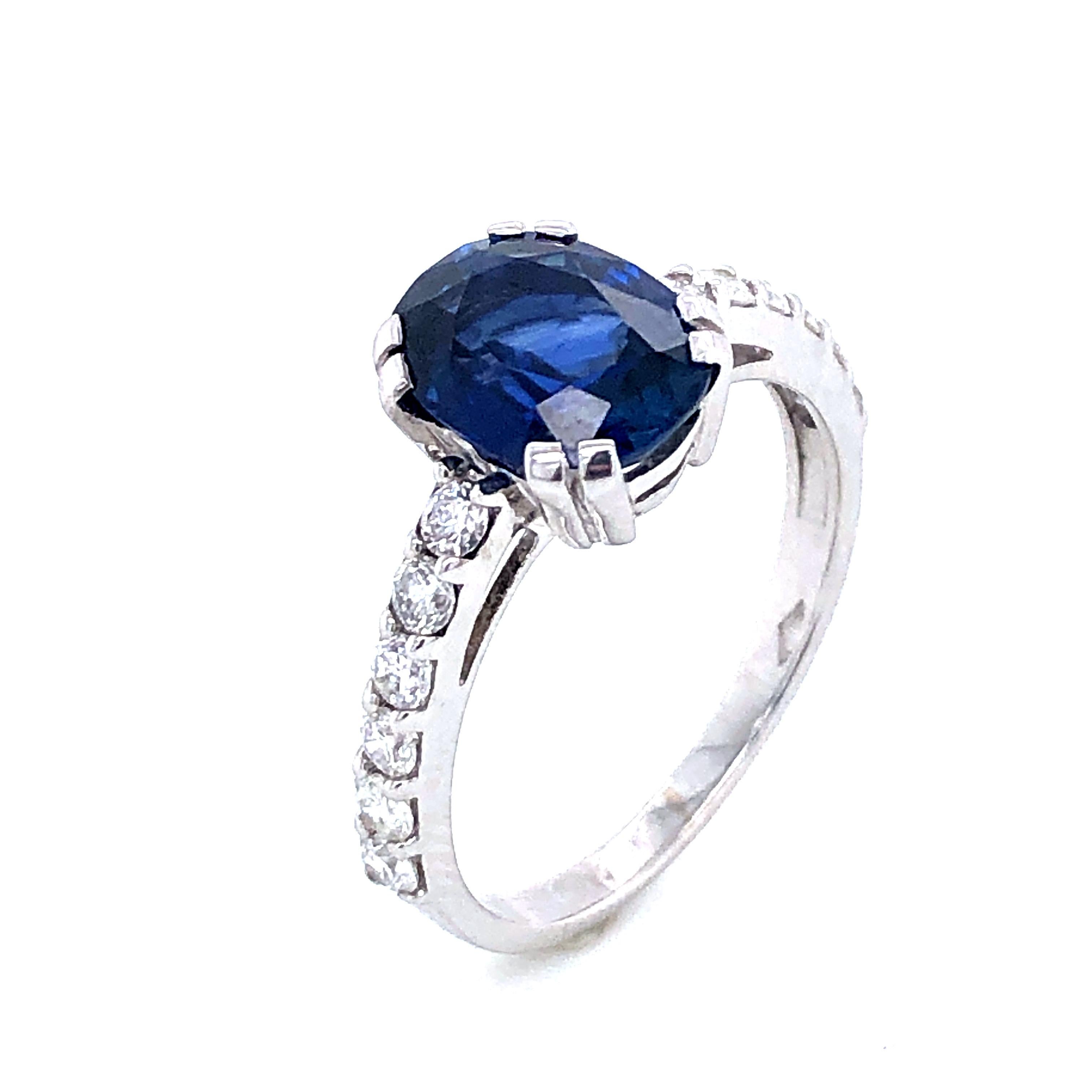 Blue Sapphire and Diamonds White Gold 18. k Ring
Blue Sapphire Form C 2,38 Carat 
12 Diamonds Color H 0.48 Carat
French Size : 54
US Size : 6 3/4
British Size :  N